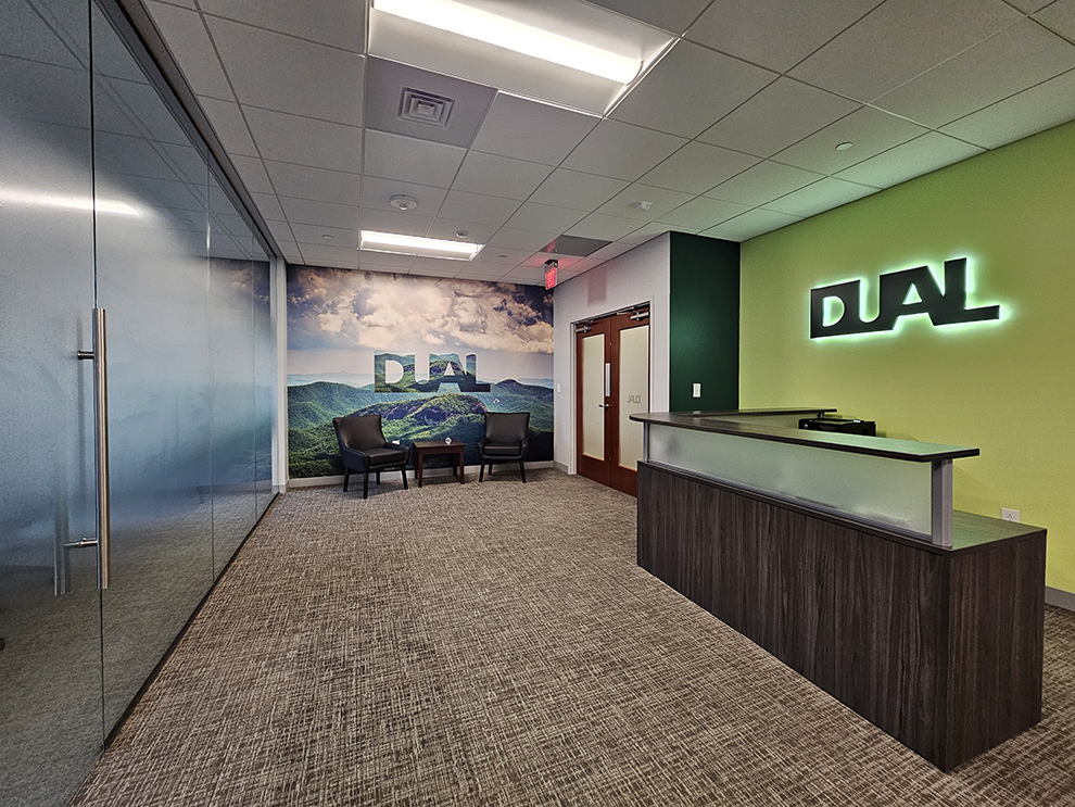 Adhesive vinyl graphics enhancing office branding in Concord, NC