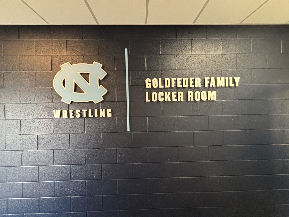 Dimensional Letters in Huntersville, NC designed and installed with backlit lighting for workplace interiors