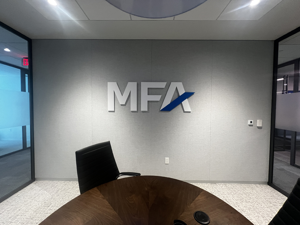 Dimensional Letters in Huntersville, NC designed and installed for hallway and directional wall signage