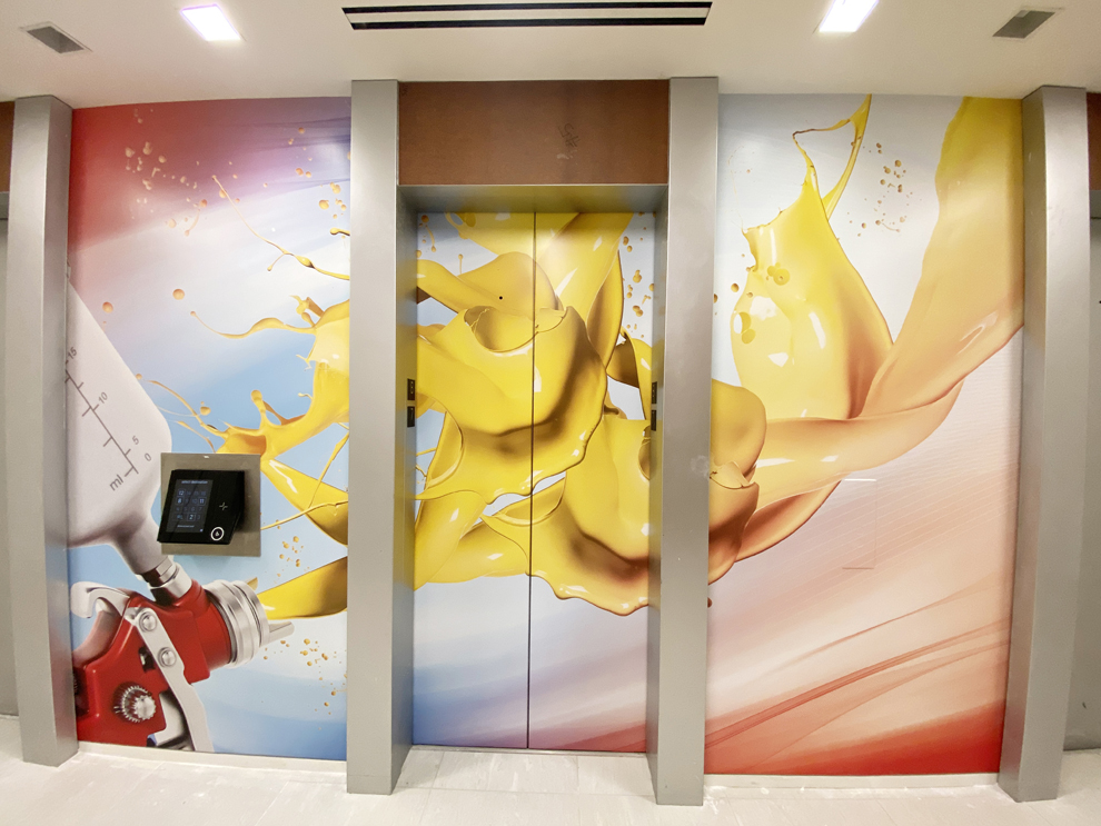 Elevator Wraps in Charlotte, NC designed and installed for corporate offices and interior signage