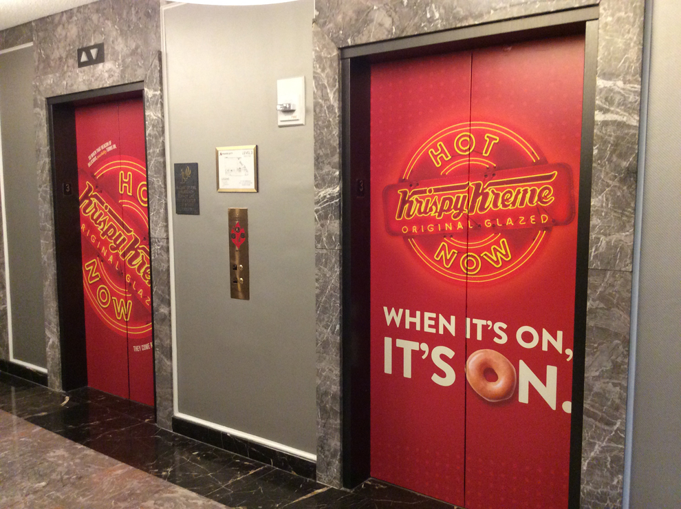 Elevator Wraps in Lincolnton, NC designed and installed for workplace environments and brand identity