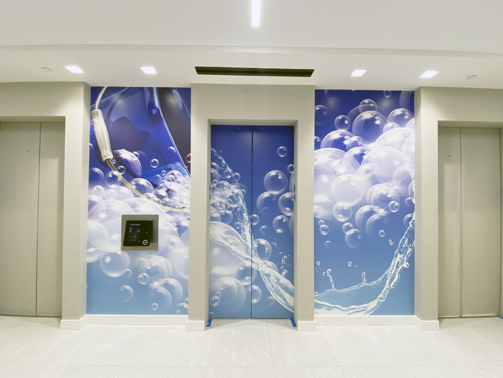 Elevator Wraps in Mooresville, NC designed and installed for elevator door graphics and workplace branding