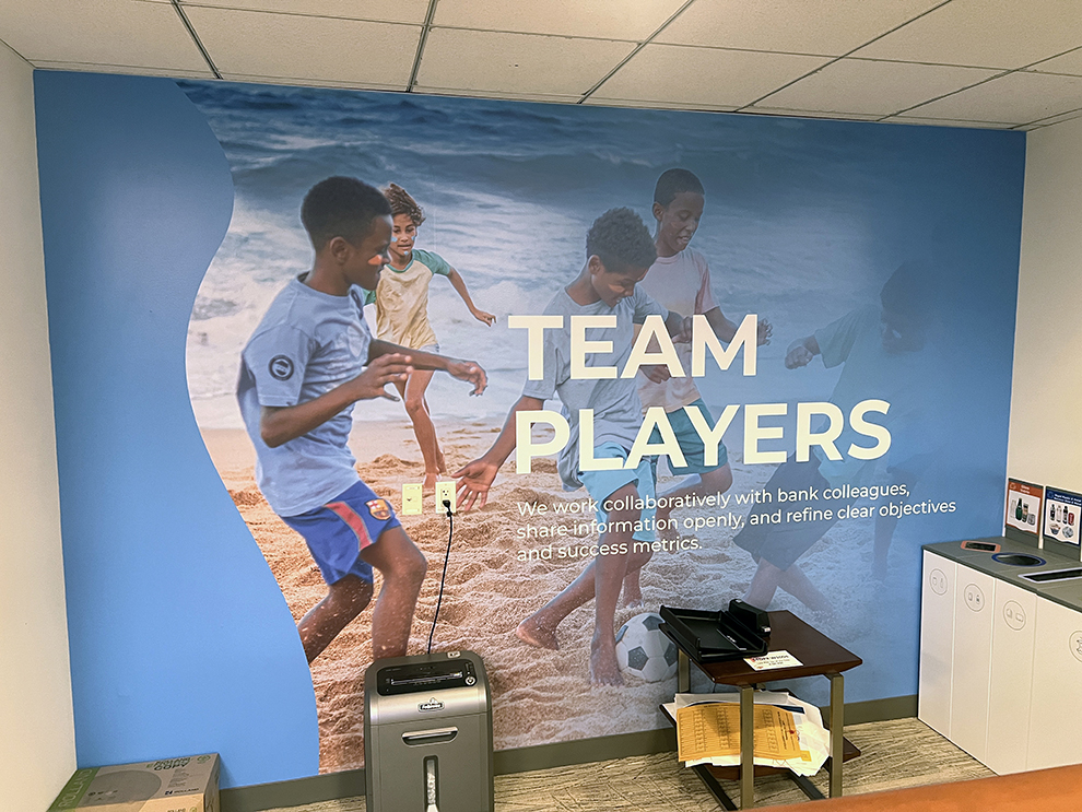 Experiential Graphics in Charlotte, NC designed and installed for office wall branding and directional signage