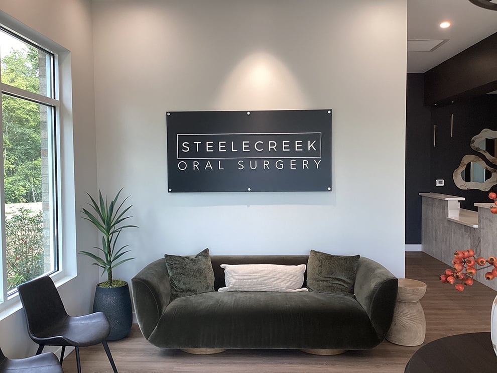 Standoff Mounted Signs in Huntersville, NC designed and installed for corporate office interiors and brand enhancement