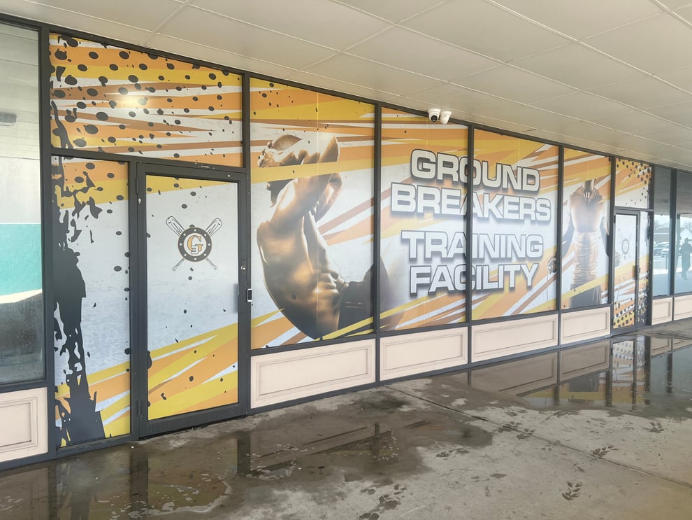 Custom storefront graphics and interior signage for business near Fort Mill, SC