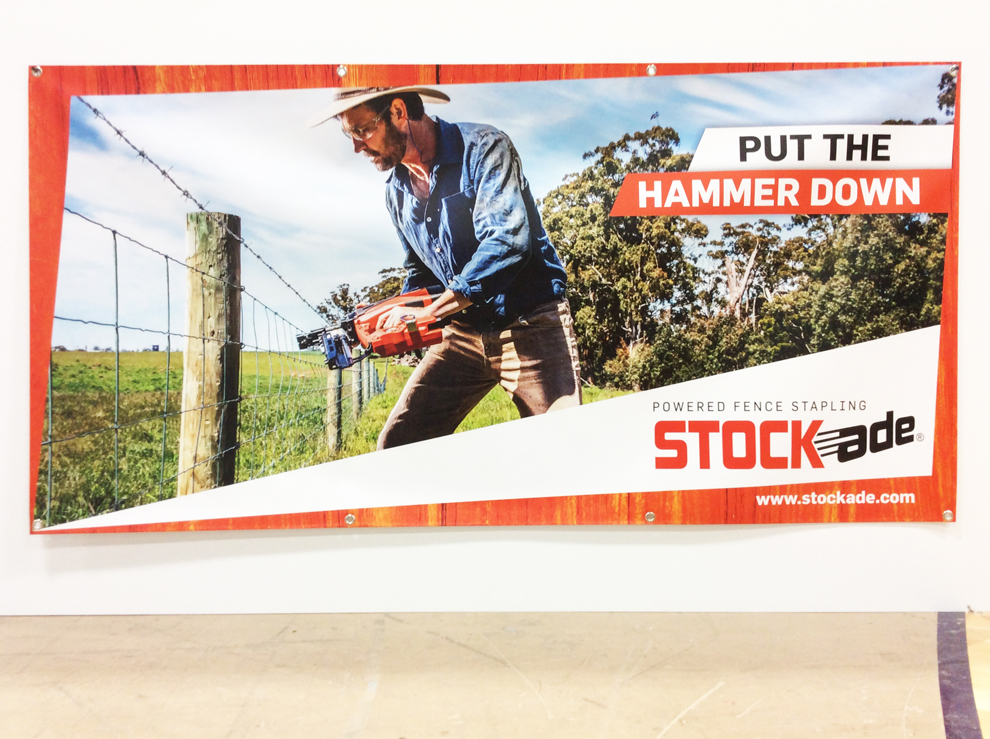 Mesh fence wraps and vinyl banners for property branding in Charlotte, NC