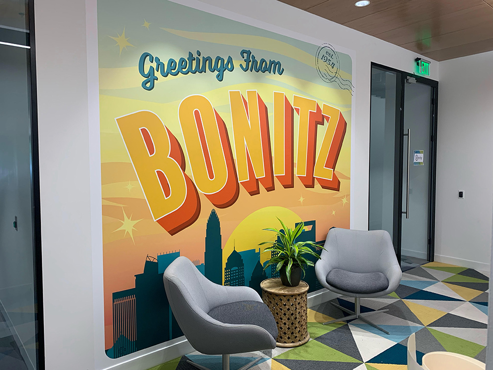Custom wall wrap graphics enhancing corporate interiors in Burlington, NC