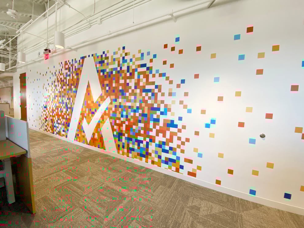 Reception area wall mural with custom branding Hickory, NC office