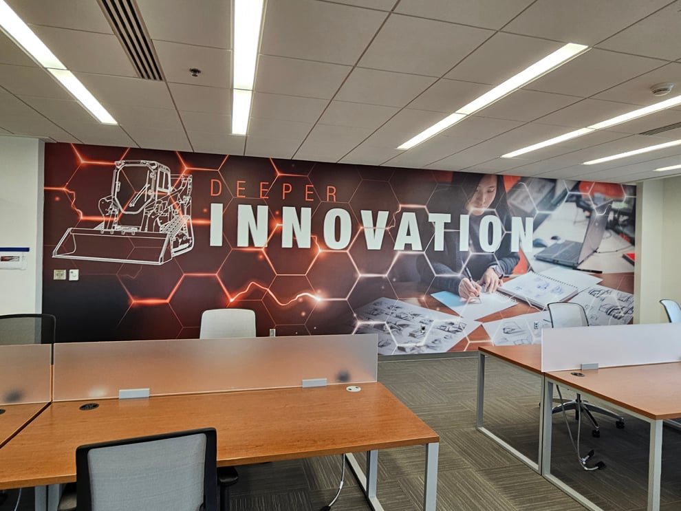 Custom wall wrap graphics enhancing corporate interiors in Hickory, NC