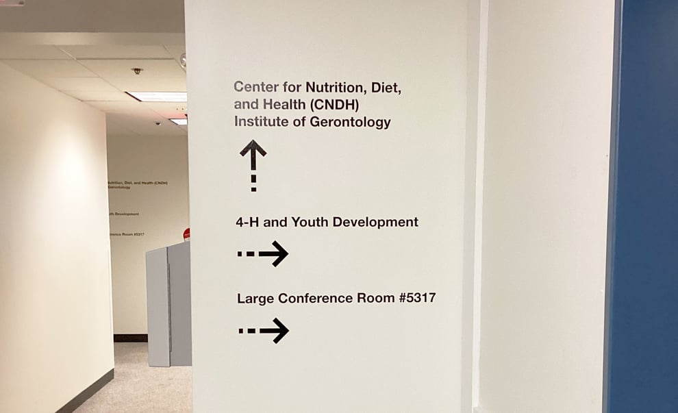 Workplace and office interiors with branded wayfinding signs in Concord, NC
