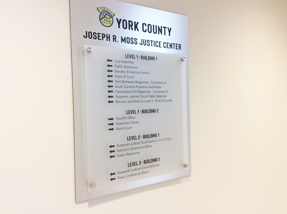 Wayfinding signs and directional graphics guiding workplace navigation in Mooresville, NC