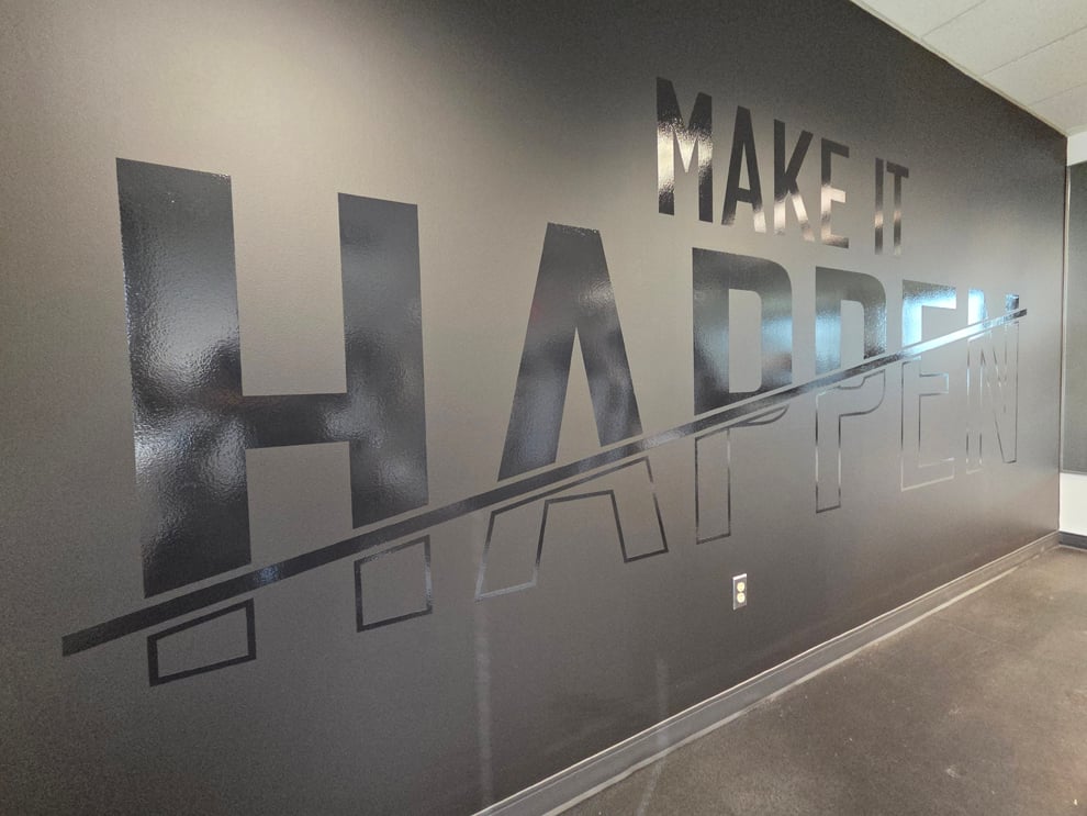 Window Graphics in Huntersville, NC designed and installed with custom decals for offices