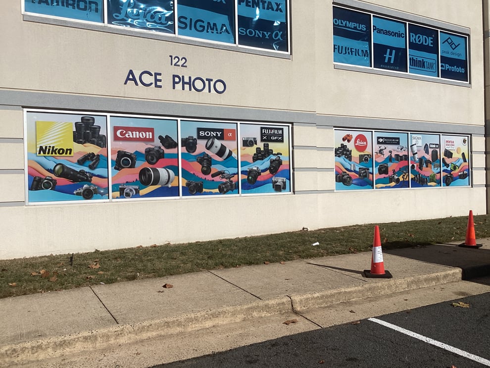 Window Graphics in Charlotte, NC designed and installed with branded vinyl lettering