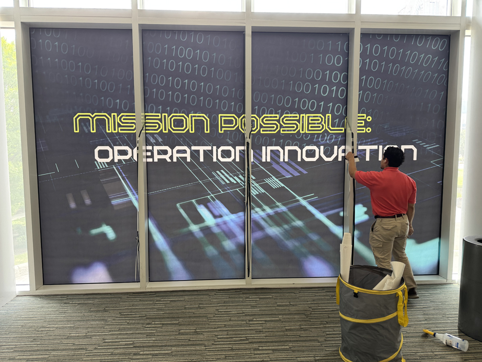 Professional office sign installation with custom graphics in Concord, NC