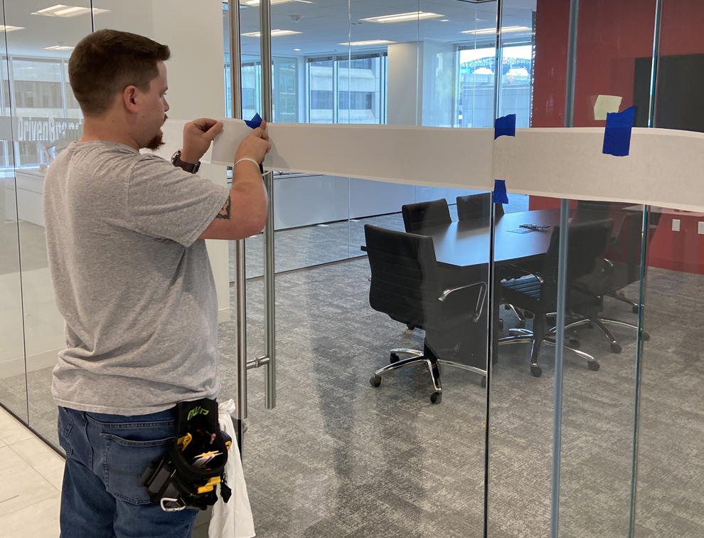 Custom office sign installation and workplace wall graphics in Concord, NC